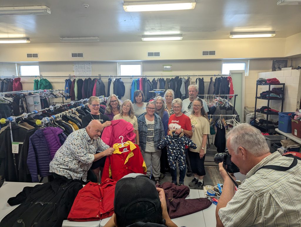 Volunteers With Coats